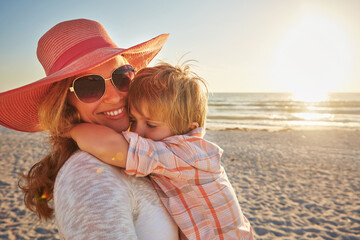 Happy mother, child and beach with hug in sunset for outdoor holiday, weekend or bonding in nature....