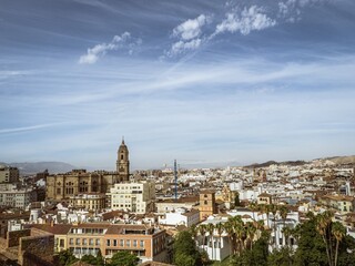 Obraz premium View of the Cathedral of Malaga with the city skyline as seen from the Alcazaba fortress