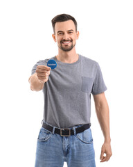 Male volunteer with badge on white background