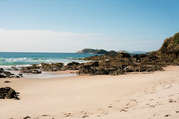 Waves hit the rocky beach
