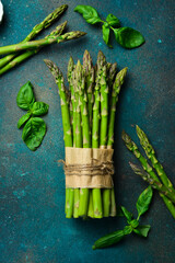 Bunch of fresh green asparagus. Organic healthy food. Close up.