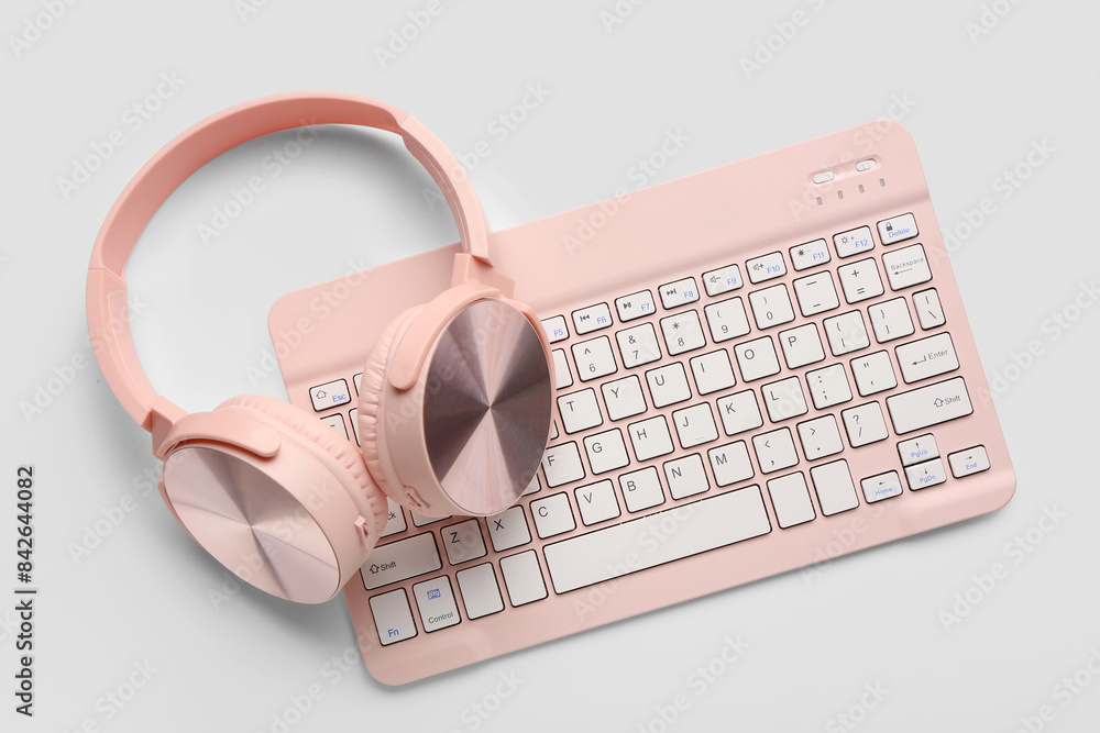 Poster modern headphones and keyboard on white background