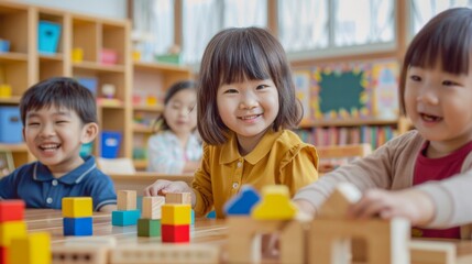 Kids playing with wooden blocks in the classroom. Educational child toys for preschool and kindergarten.