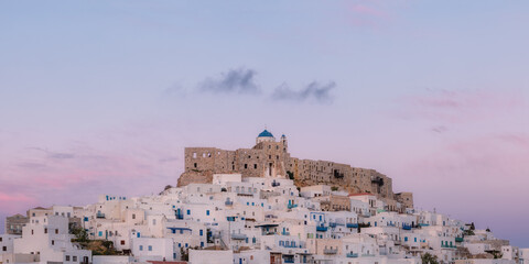 View of the castle in Astypalea, Greece during a beautiful sunset.