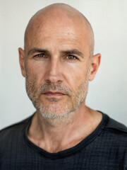 Obraz premium Bald man with a bright personality. Stylish bald-headed person on white background