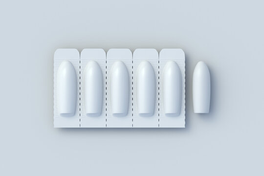 Closed and open suppositories for vaginal or anal use on gray background. Candles for treatment of hemorrhoids or inflammation. Medical suppositories. Pharmaceutical products. Top view. 3d render