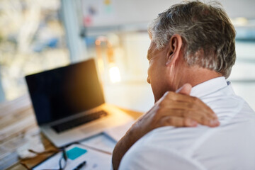 Obraz premium Man, business and workplace with shoulder pain or injury for health, hand for burnout stress or crisis. Male manager, medical problem and spine condition, accountant with neck fatigue in office