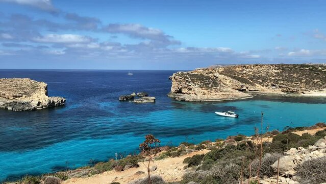 Comino Island Malta, Boat rides and visits to Comino Caves. Blue mediterranean sea. High quality 4k footage