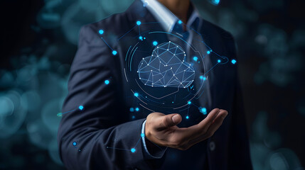 Businessman holding a cloud technology icon in his hand on a dark background. a close up of a man wearing a suit 