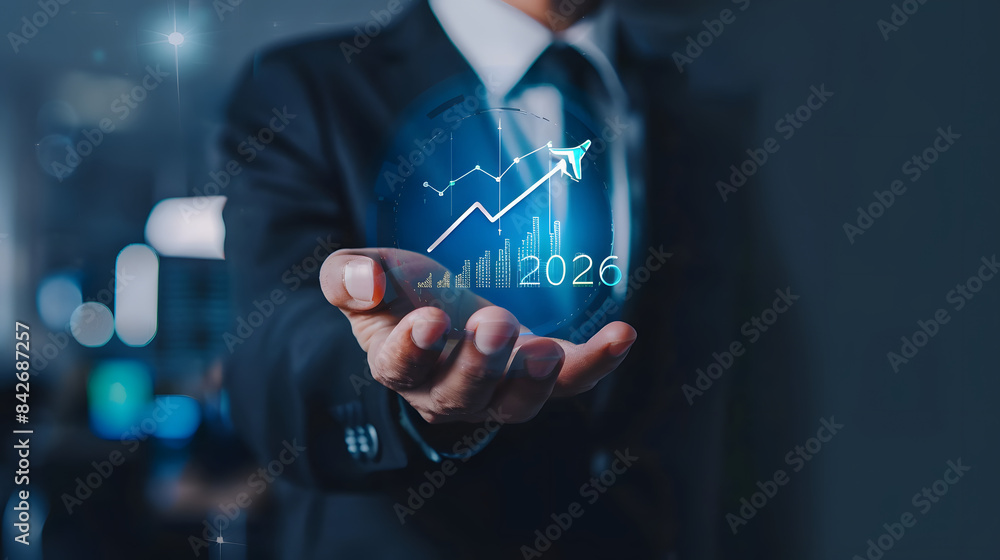 Poster businessman holding a virtual hologram icon of a growth graph and arrow up with the text 2026