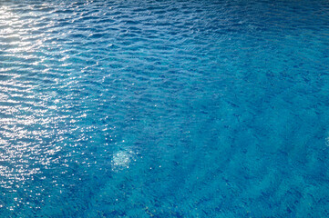 Swimming Pool Surface With Light Reflection and Water Ripple Patterns 1