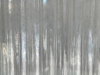 Abstract close up of ridged clear depression glass with a prism effect