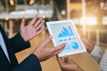 Hands, graphs and tablet for financial review strategy, data report and growth chart statistics. Business people, teamwork and information by discussion, screen with analytics and company investment