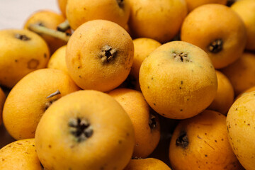 Bright medlar in a bowl