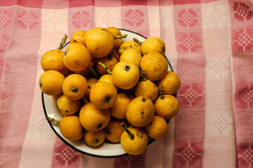 Bright medlar in a bowl