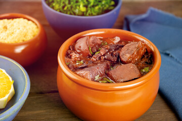 Brazilian Feijoada Food black bean stew with bacon, pork sausage and dried meat