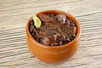 Brazilian Feijoada Food black bean stew with bacon, pork sausage and dried meat