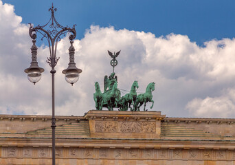 Fototapeta premium Antique chariot with four horses on top of the Brandenburg Gate