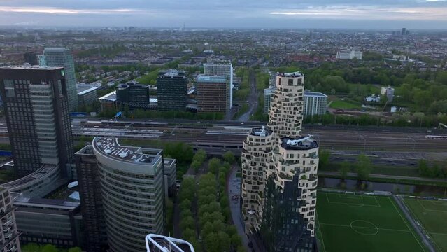 Aerial Drone Shot of Amsterdam Zuidas Financial District. Modern City with high Skyscrappers in Amsterdam, Netherlands.