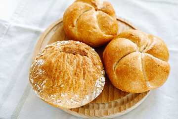 Kaiser buns made wheat dough, with golden crust