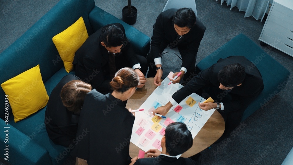 Poster top view of business people hands making scrum task board to manage workflow in workplace. diverse m
