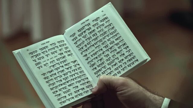 Jewish man read from the Bible torah