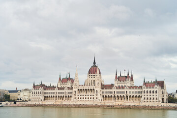 Hungarian Parliament Building in the evening at the Danube river in Budapest, Hungary. High quality photo