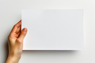 Obraz premium Blank paper mockup on hand created with generative AI