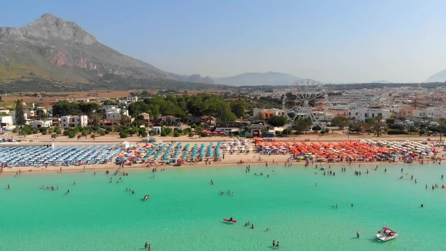 Aerial shot of famous San Vito Lo Capo - beach and town in Sicily, Italy.