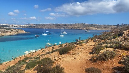 Comino Island Malta, Boat rides and visits to Comino Caves. Blue mediterranean sea. High quality...