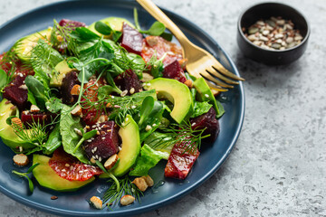 Fresh healthy avocado,  blood orange, beetroot salad