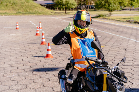 Young happy women driving motorcycles, cars, trucks, and scooters and learning traffic rules for passing driver license exams.