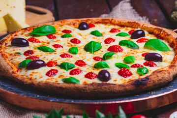 pizza on a wooden table