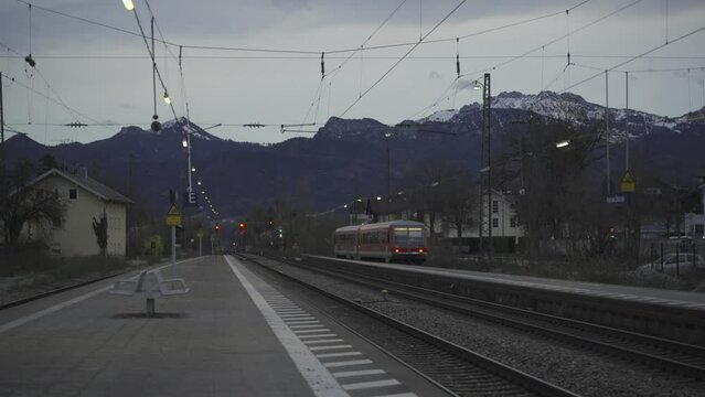  Prien am Chiemsee, Germany. Railway station DB in foothills in Bavaria Prien am Chiemsee in evening. Bahnhof Prien a Chiemsee. Deutschen Bahn und der Bayerischen Regiobahn Zug. 