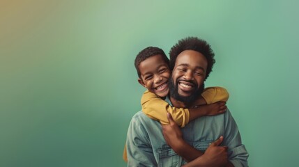 Obraz premium Father And Son Smiling And Hugging Each Other On a Green Background, Father's Day Wallpaper, Studio Photo
