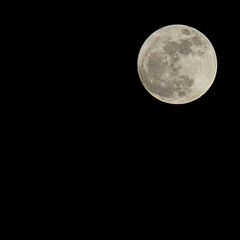 Full moon in black sky at night