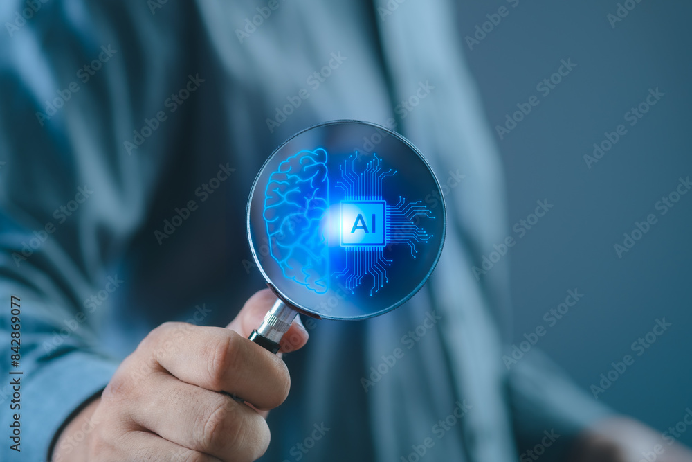 Wall mural searching for information in technology with ai systems concept, businessman hand holding magnifying