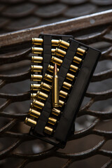 Cartridges for a carbine. Ammunition for rifled weapons. Dark lattice back