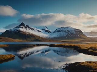 Fototapeta premium A beautiful sunrise with mountains and a boat on the water