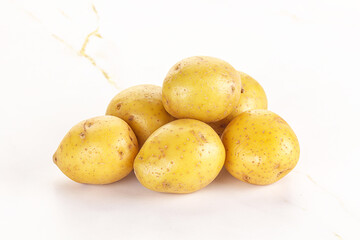 Raw young baby potato heap