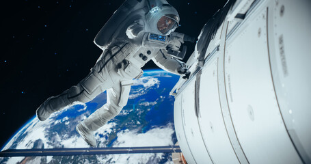 Professional Space Engineer Servicing a Panel on a Communication Satellite with an Automatic Screw Gun. Brave Astronaut Working in Outer Space with Beautiful Blue Planet Earth in the Background © Gorodenkoff