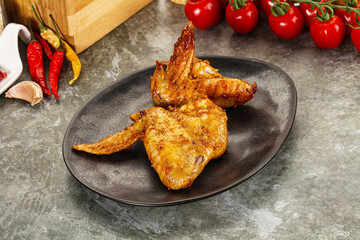 Tasty roasted chicken wing with spices