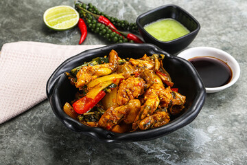 Vietnamese cuisine - fried frog with vegetables