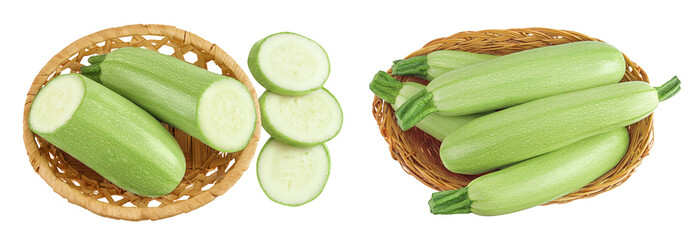 zucchini or marrow in a wicker basket isolated on white background with full depth of field. Top view. Flat lay