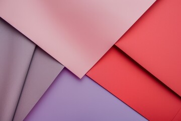 Obraz premium Minimalist composition of pink, purple, and red paper sheets with geometric shapes and vibrant colors. Ideal for flyers, brochures, posters, and invitations. Sophisticated yet playful and romantic