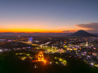 Aerial view of Nhan temple, tower is an artistic architectural work of Champa people in Tuy Hoa city, Phu Yen province, Vietnam. Sunset view