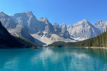 View from a boat to the mountains on Moraine Lake in the morning. Moraine Lake, Banff.
