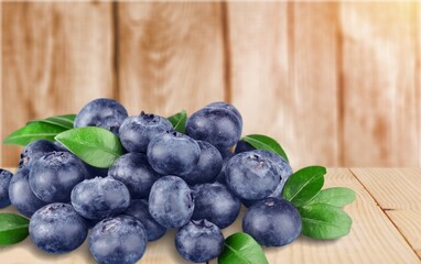 ripe sweet tasty blueberry on the desk