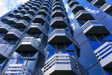 Skyward View of Modern Building with Geometric Facade