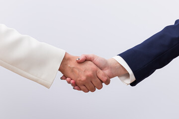 Business women shaking hands isolated on white background with copy space. Business concept, collaborators, teamwork and business woman
